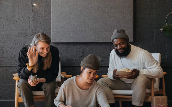 Group of students sitting at a table studying together